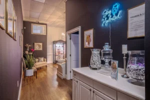 Hydration bar with neon Stay Hydrated sign at Jolie Visage in Murrells Inlet